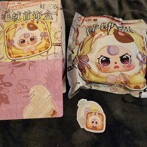 Baby Three sealed bag box opened from bottom.